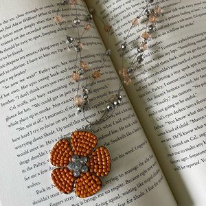4 strands wire with mix beads and large orange color flower pendant